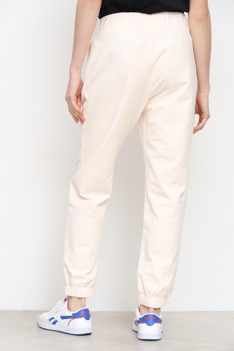 Спортивные брюки UNQ бежевые