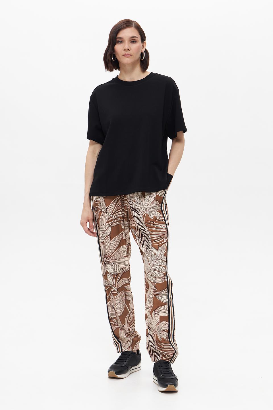 Брюки UNQ с принтом и полосками