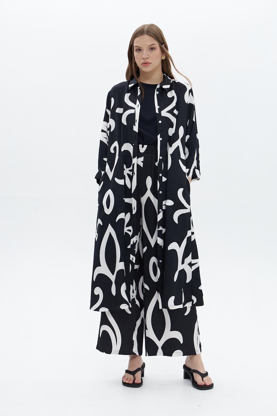 Брюки UNQ с принтом