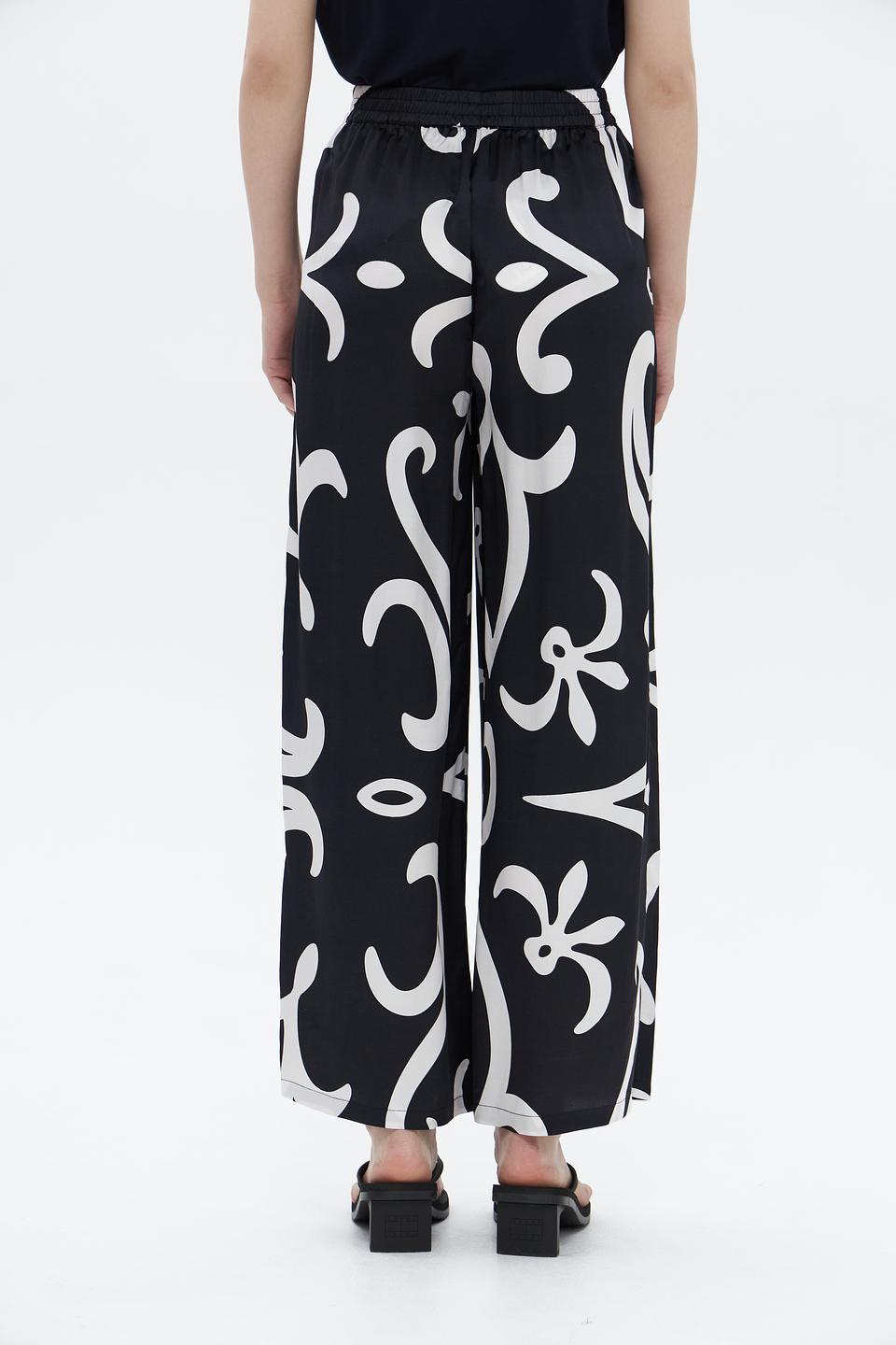 Брюки UNQ с принтом