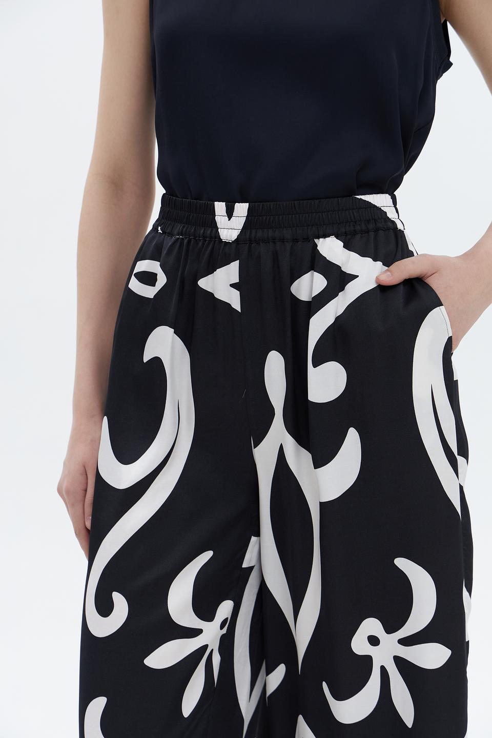 Брюки UNQ с принтом