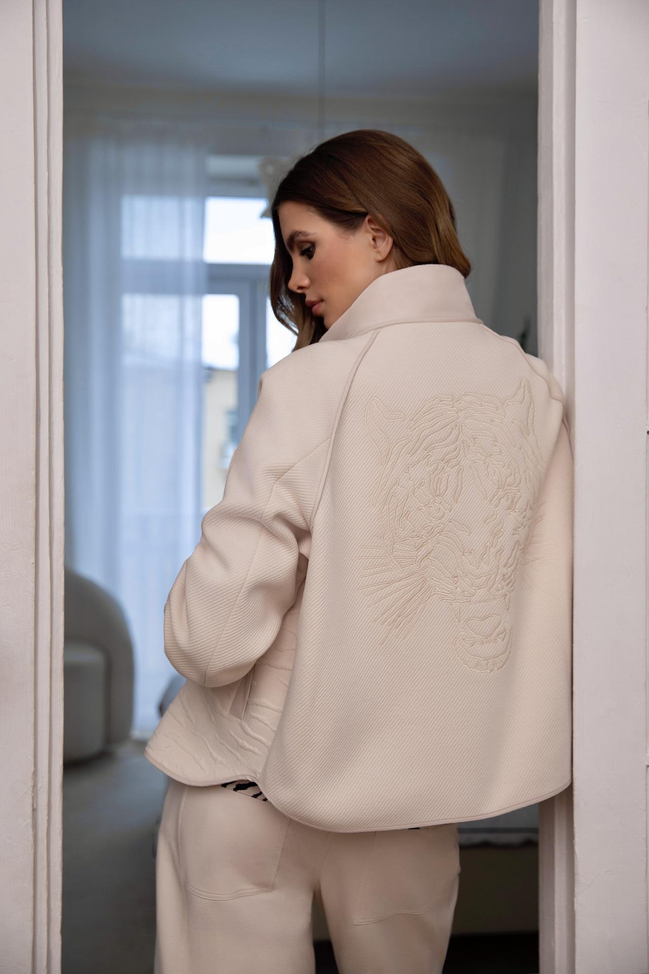 Бежевый спортивный образ Marc Cain